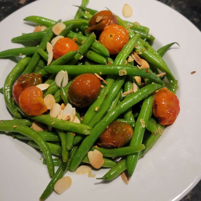 Green Bean Amandine with burst tomatoes